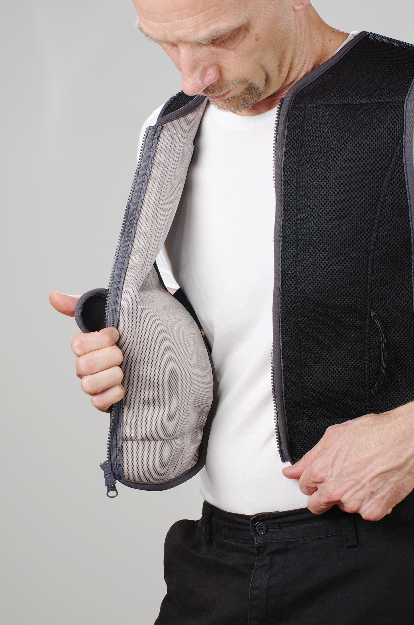 Our original Maximo Cooling Vest on a man