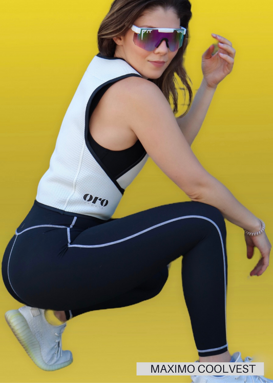 An athlete wearing a beautiful white cooling vest to improve her game